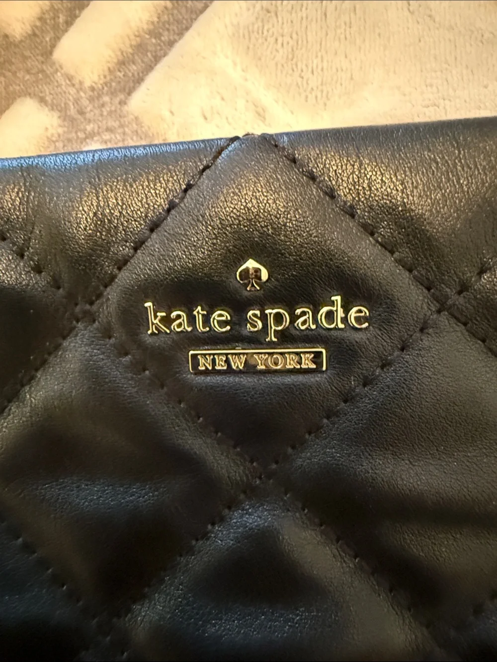 kate spade Black Quilted Leather Crossbody with Gold Chain Accent